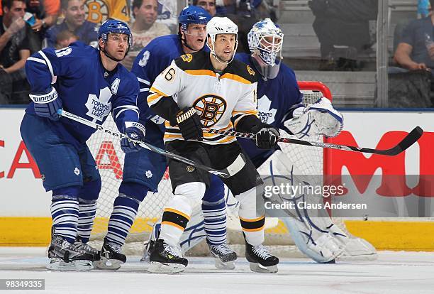 Marco Sturm of the Boston Bruins waits to tip a shot next to Francois Beauchemin of the Toronto Maple Leafs in a game on April 3, 2010 at the Air...