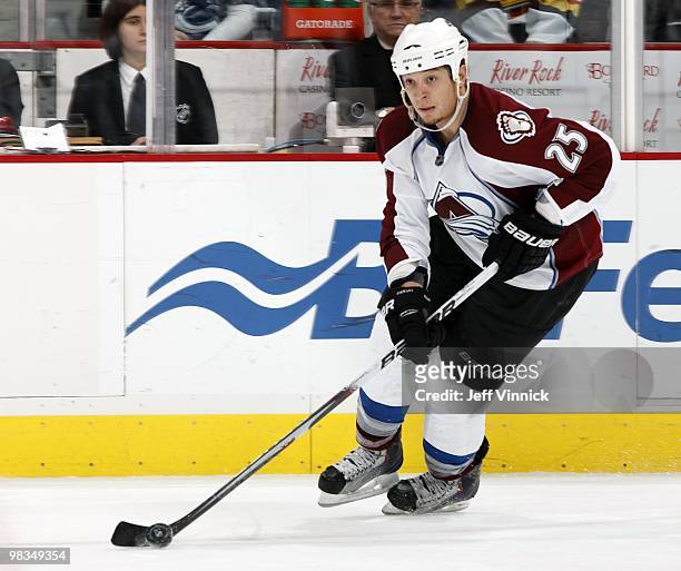 Chris Stewart of the Colorado Avalanche skates up ice with the puck during the game against the Vancouver Canucks at General Motors Place on April 6,...