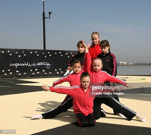 Gymnasts perform during the opening of the adiZone at Gordon Promenade, Riverside Leisure area on April 9, 2010 in Gravesend, England. AdiZones are...
