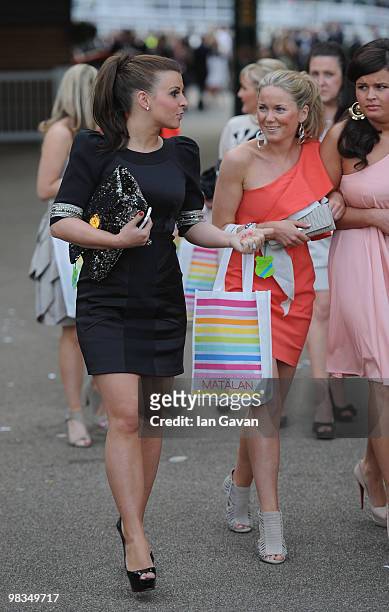 Coleen Rooney departs with friends after Ladies' Day at Aintree Racecourse on April 9, 2010 in Liverpool, England.