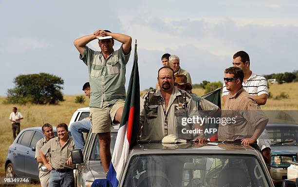 Supporters of the Afrikaans Resistance Movement attend the funeral of white supremacist Eugene Terre'Blanche on his farm on April 9, 2010 in...