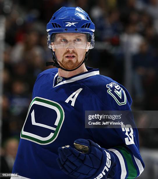 Henrik Sedin of the Vancouver Canucks looks on from the bench during the game against the Colorado Avalanche at General Motors Place on April 6, 2010...