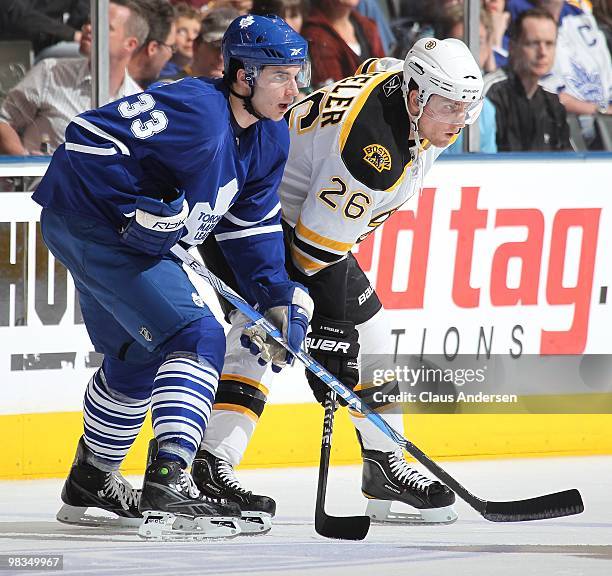 Blake Wheeler of the Boston Bruins waits for a faceoff against Luca Caputi of the Toronto Maple Leafs in a game on April 3, 2010 at the Air Canada...