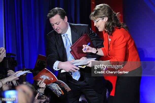 Former Alaska Governor Sarah Palin signs autographs at the Southern Republican Leadership Conference, April 9, 2010 in New Orleans, Louisiana. Many...