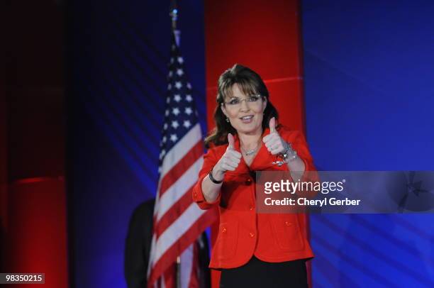 Former Alaska Governor Sarah Palin gives two thumbs up to the audience at the Southern Republican Leadership Conference, April 9, 2010 in New...