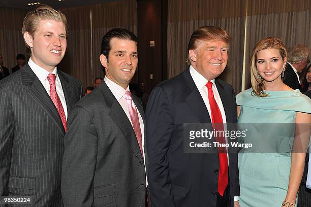 Donald Trump Jr, Eric Trump, Donald Trump and Ivanka Trump attends the ribbon cutting ceremony at the Trump SoHo on April 9, 2010 in New York City.