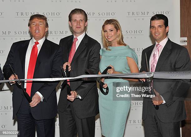 Donald Trump, Donald Trump Jr., Ivanka Trump and Eric Trump attend the ribbon cutting ceremony at the Trump SoHo on April 9, 2010 in New York City.