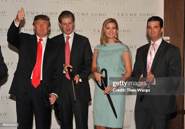 Donald Trump, Donald Trump Jr., Ivanka Trump and Eric Trump attend the ribbon cutting ceremony at the Trump SoHo on April 9, 2010 in New York City.