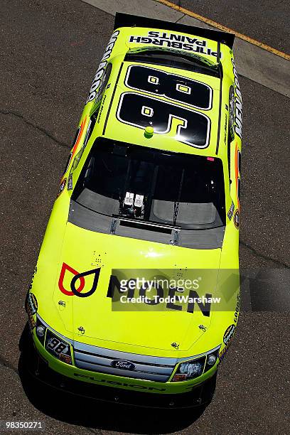 Paul Menard, driver of the Moen/Menards Ford, drives through the garage during practice for the NASCAR Sprint Cup Series Subway Fresh Fit 600 at...