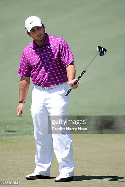 Francesco Molinari of Italy reacts to a birdie putt on the second hole during the second round of the 2010 Masters Tournament at Augusta National...
