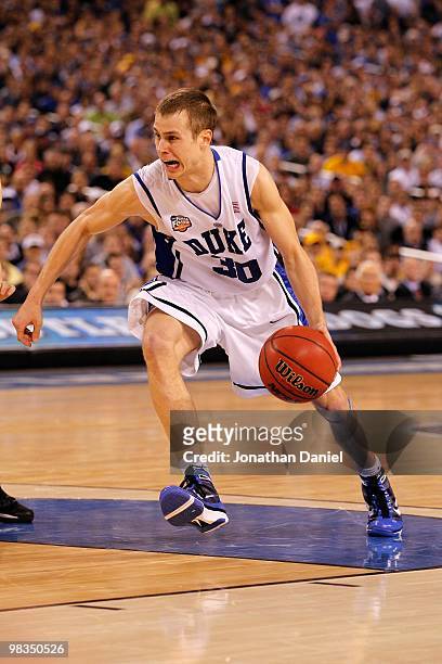 Jon Scheyer of the Duke Blue Devils drives in the second half against the Butler Bulldogs during the 2010 NCAA Division I Men's Basketball National...