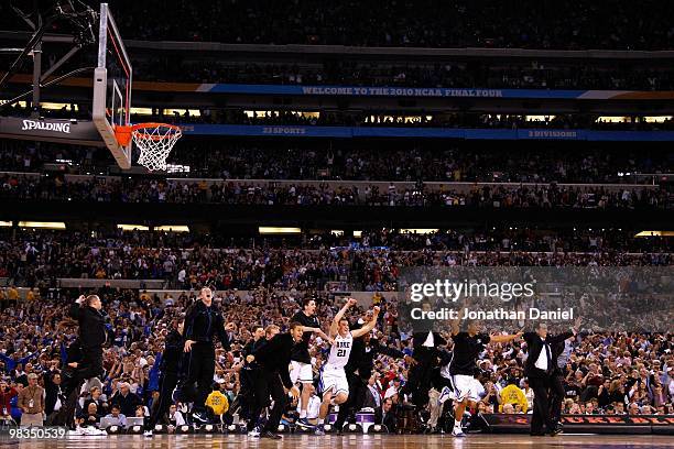 Head coach Mike Krzyzewski of the Duke Blue Devils and his players celebrate after they won 61-59 against the Butler Bulldogs during the 2010 NCAA...