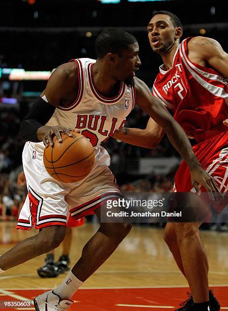 Hakim Warrick of the Chicago Bulls moves against Jared Jefferies of the Houston Rockets at the United Center on March 22, 2010 in Chicago, Illinois....