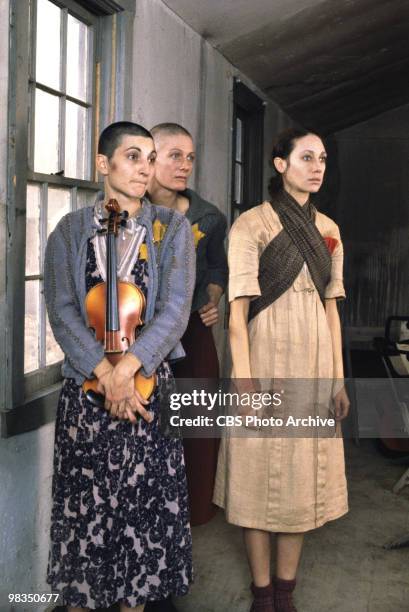 British actress Vanessa Redgrave stands between American actresses Robin Bartlett and Marisa Berenson in a scene from the made-for-televsion film...