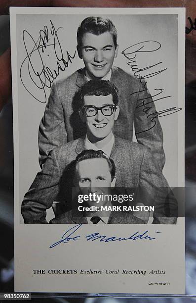 Buddy Holly and The Crickets Band signed postcard on display before an auction of the late singers memorabilia at the Heritage Auction Gallery in...