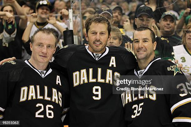 Jere Lehtinen; Mike Modano and Marty Turco of the Dallas Stars at American Airlines Center on April 8, 2010 in Dallas, Texas.