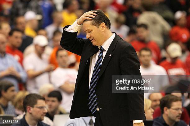 Head coach John Calipari of the Kentucky Wildcats reacts as he coaches against the Cornell Big Red during the east regional semifinal of the 2010...