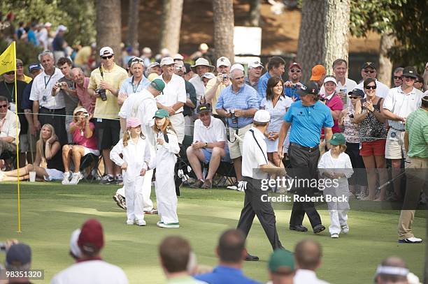 Masters Preview: Phil Mickelson family, daughters Sophia and Amanda and son Evan during Par 3 Contest on Wednesday at Augusta National. Augusta, GA...