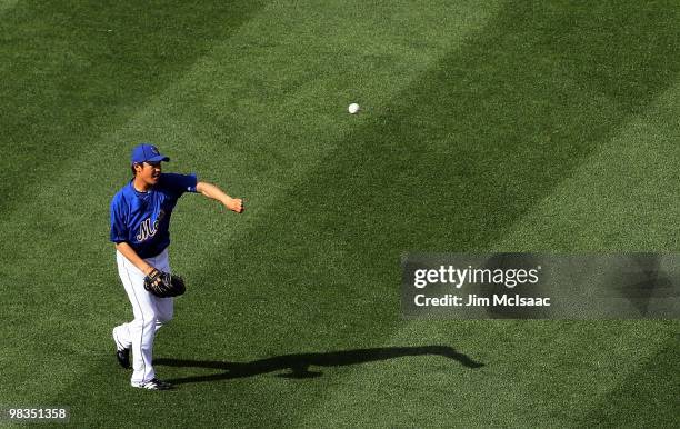 Hisanori Takahashi of the New York Mets takes fielding practice prior to playing against the Florida Marlins on April 8, 2010 at Citi Field in the...