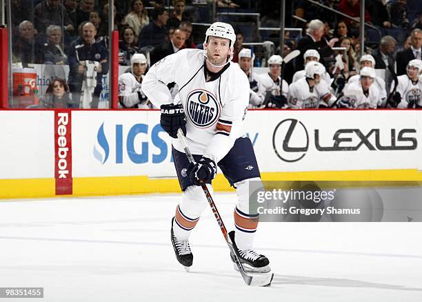 Ryan Whitney of the Edmonton Oilers controls the puck at the blueline during their NHL game against the Columbus Blue Jackets on March 15, 2010 at...
