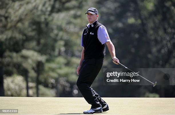 Steve Stricker reacts to a missed putt on the 18th green during the second round of the 2010 Masters Tournament at Augusta National Golf Club on...