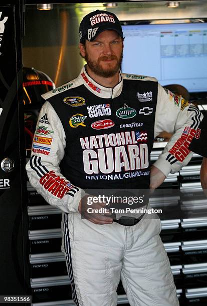 Dale Earnhardt Jr., driver of the National Guard/AMP Energy Chevrolet, looks on during practice for the NASCAR Sprint Cup Series Subway Fresh Fit 600...