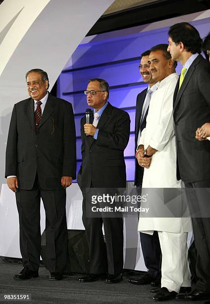 Civil Aviation Minister Praful Patel listens as N R Narayan Murthy, Chairman and chief mentor of the Infosys Technologies Ltd, speaks after receiving...