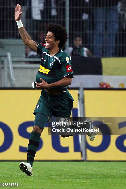 Dante of Gladbach celebrates after scoring his team's second goal during the Bundesliga match between Borussia Moenchengladbach and Eintracht...