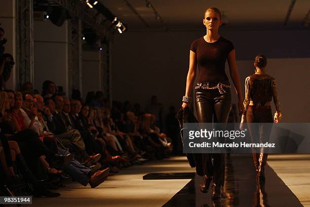 Model displays a creation by Chile's former Miss Universe Cecilia Bolocco on April 8, 2010 in Santiago, Chile. Bolocco began designing for women over...