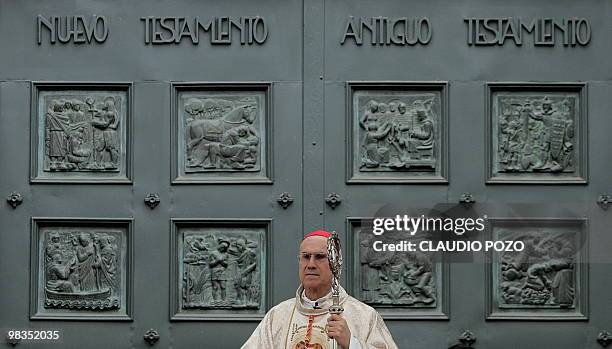 Vatican's Cardinal Secretary of State Tarcisio Bertone officiates a mass in Concepcion, some 500 km south of Santiago on Abril 09, 2010. A massive...