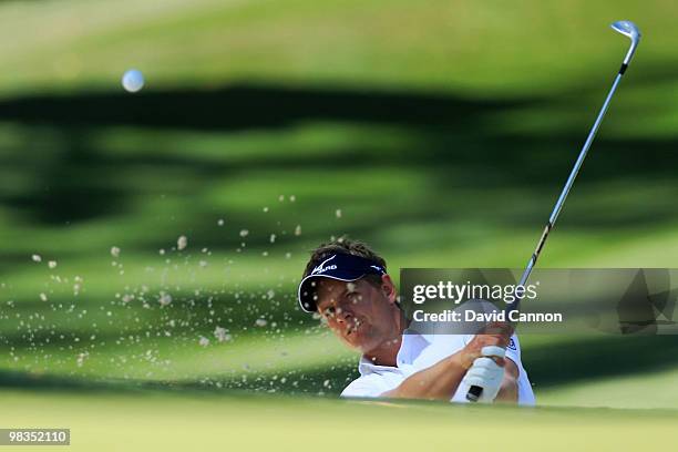 Luke Donald plays a bunker shot on the tenth hole during the second round of the 2010 Masters Tournament at Augusta National Golf Club on April 9,...