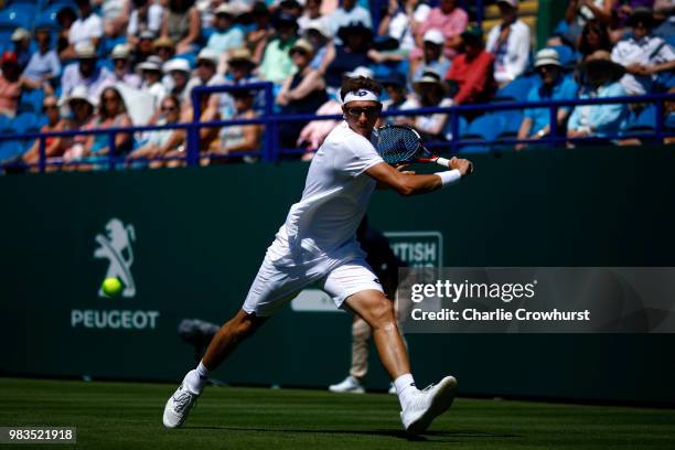 Denis Istomin of Uzbekistan in action during his mens singles match against Andreas Seppi of Italy during Day Four of the Nature Valley International...