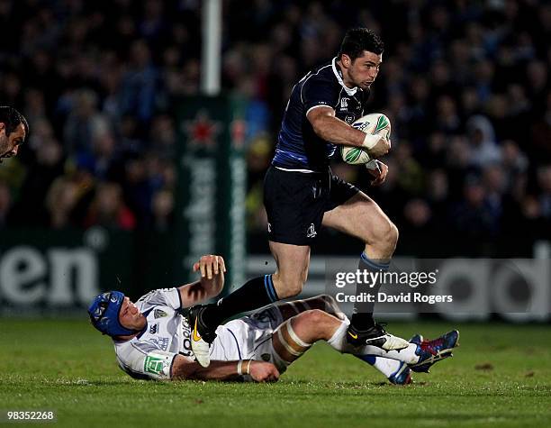Rob Kearney of Leinster moves past Julein Bonnaire during the Heinken Cup quarter final match between Leinster and Clermont Auvergne at the RDS on...