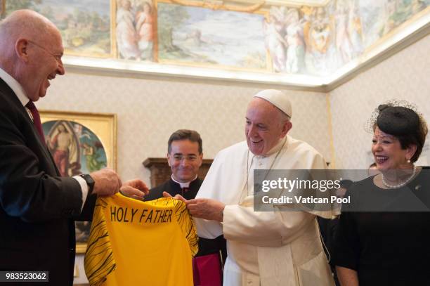 Pope Francis exchanges gifts with the Governor-General of the Commonwealth of Australia Peter Cosgrove and his wife Lady Lynne Cosgrove during an...