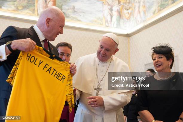 Pope Francis exchanges gifts with the Governor-General of the Commonwealth of Australia Peter Cosgrove and his wife Lady Lynne Cosgrove during an...