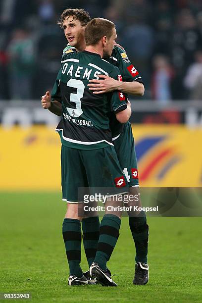 Filip Daems of Gladbach and Roel Brouwers of Gladbach celebrate the 2:0 victory after the Bundesliga match between Borussia Moenchengladbach and...
