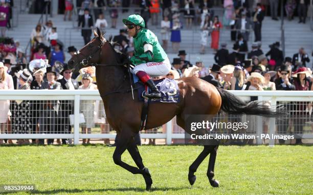 Emblazoned ridden by Jockey Frankie Dettori goes to post for the Commonwealth Cup