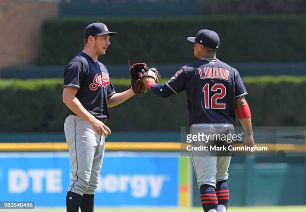 Trevor Bauer and Francisco Lindor of the Cleveland Indians congratulate each other during the game against the Detroit Tigers at Comerica Park on May...