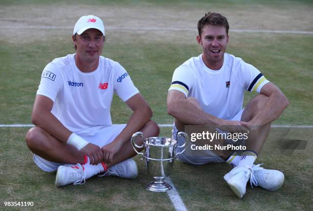 Henri Kontinen white Cap and John Peers with Trophy during Fever-Tree Championships Doubles Final match between Jamie Murray and Bruno Soares against...