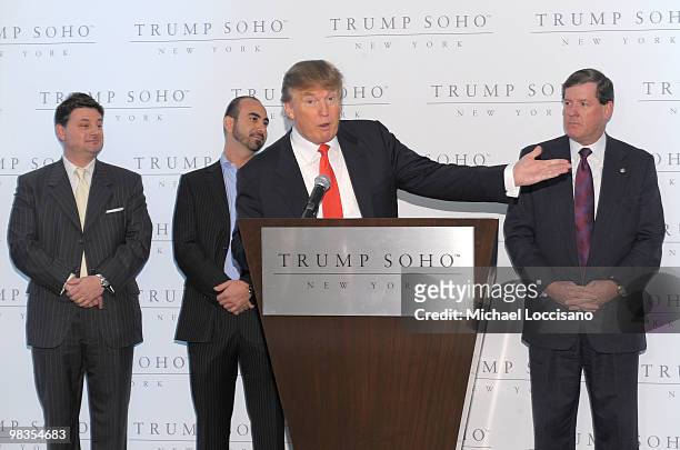 Developers Julius Schwartz and Alex Sapir, Donald Trump and New York City Deputy Mayor Bob Lieber attend the ribbon cutting ceremony for Trump SoHo...