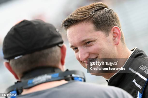 Jordan Anderson Bommarito Automotive Group, Lucas Oil Chevrolet Silverado talks with a crew member after qualifying for the NASCAR Camping World...