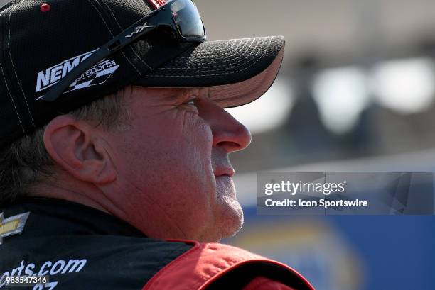 Joe Nemechek Joe Nemecheck Racing Chevrolet Silverado looks on during the NASCAR Camping World Truck Series Villa Lighting delivers the Eaton 200...