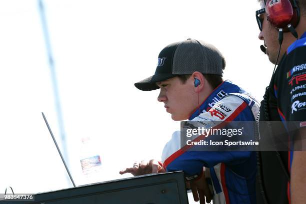 Chad Finley Certified Service Centers Chevrolet Silverado checks out an engineering monitor during qualifying for the NASCAR Camping World Truck...