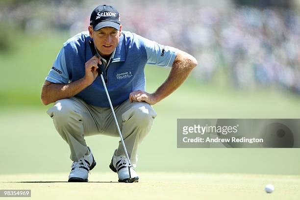 Jim Furyk lines up his putt on the first green during the second round of the 2010 Masters Tournament at Augusta National Golf Club on April 9, 2010...