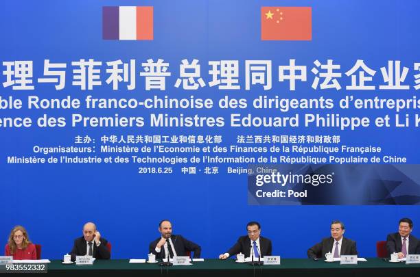 Chinese Premier Li Keqiang speaks during a meeting with French Prime Minister Edouard Philippe French Justice Minister Nicole Belloubet , French...