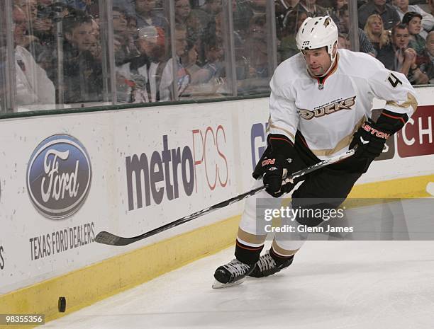 Aaron Ward of the Anaheim Ducks chases down the loose puck against the Dallas Stars on April 8, 2010 at the American Airlines Center in Dallas, Texas.