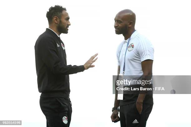 Ahmed Elmohamady of Egypt speaks with Shikabala of Egypt during a pitch inspection prior to the 2018 FIFA World Cup Russia group A match between...