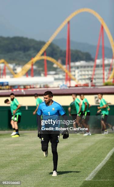 Mathew Ryan of Australia warms up during a training session during an Australian Socceroos media opportunity at Park Arena on June 25, 2018 in Sochi,...