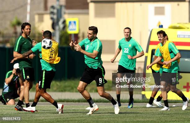 Tomi Juric of Australia runs with the ball during a training session during an Australian Socceroos media opportunity at Park Arena on June 25, 2018...