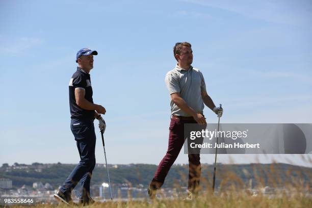 Alister Tawse and Tom Orton of Lanhydrock Golf Club stand on a tee during The Lombard Trophy South West Qualifier at Royal North Devon Golf Club on...